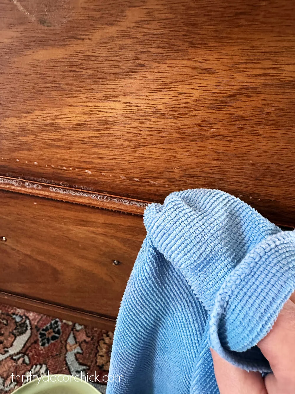 cleaning detailed furniture